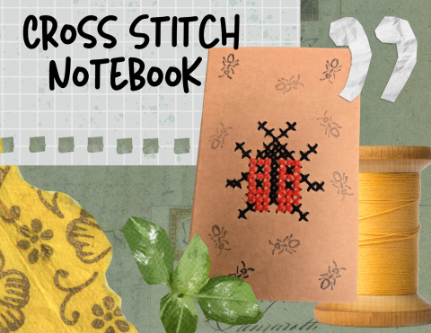 a brown paper notebook with a cross-stitch ladybug motif 