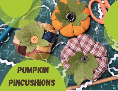 three small pumpkins made of fabric 