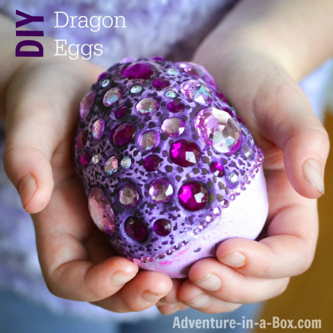 Purple dragon egg made of clay with beads decorating it