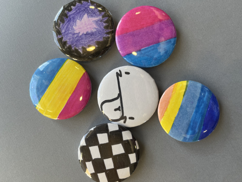 2-inch round buttons with colorful designs
