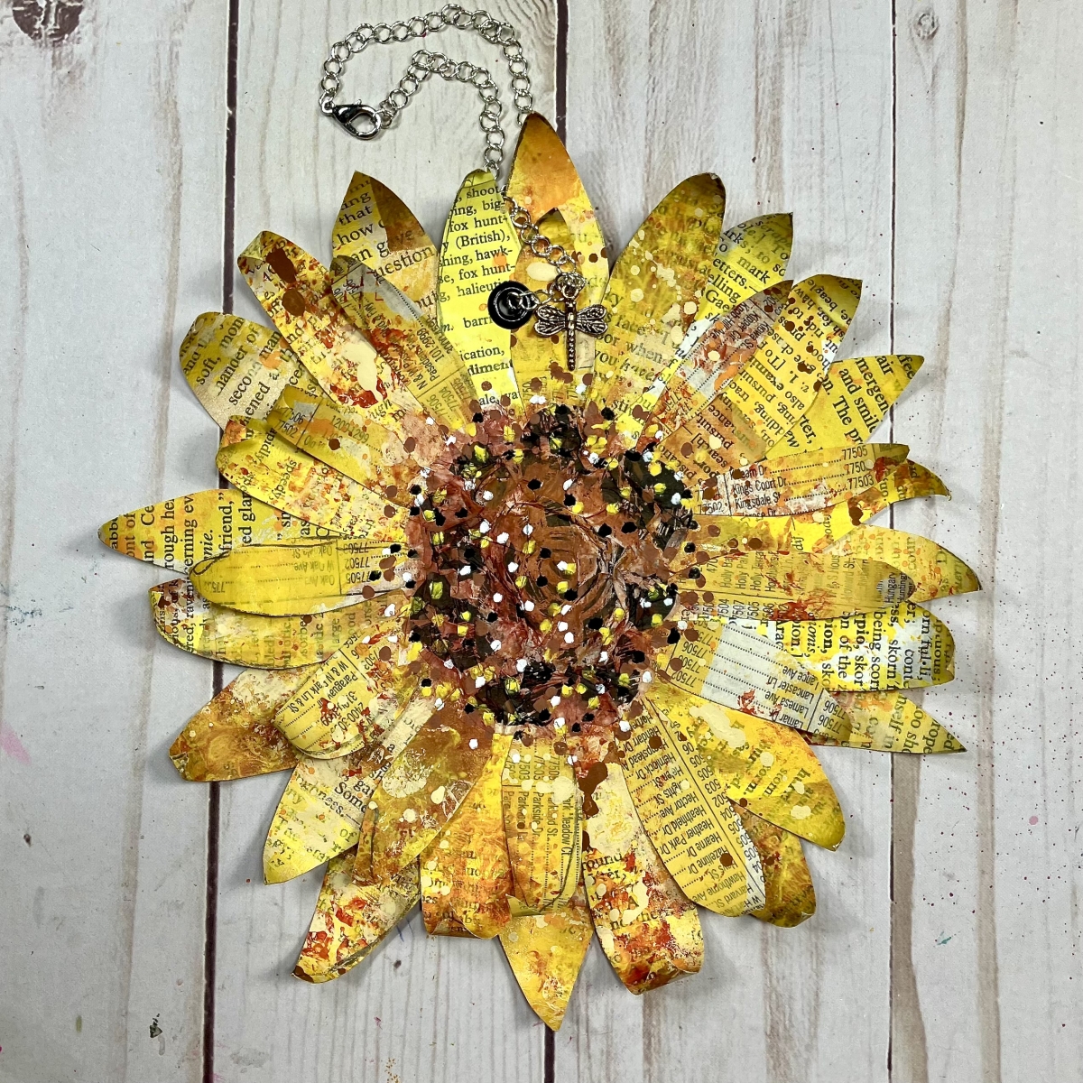 journal in the shape of a sunflower made from book pages