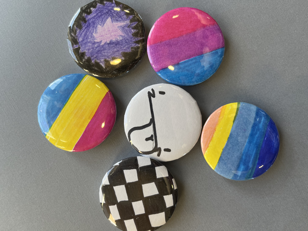 2-inch round buttons with colorful designs