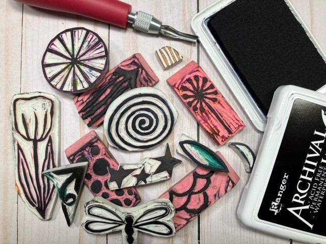 a selection of stamps carved out of  various erasers